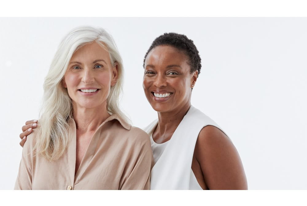 Women smiling together