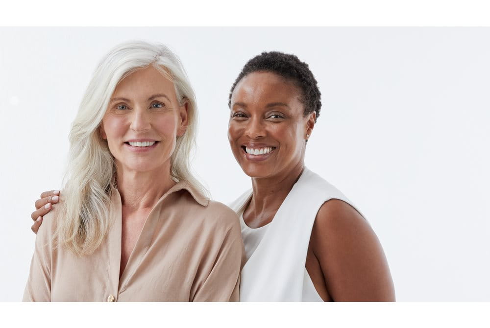 Women smiling together