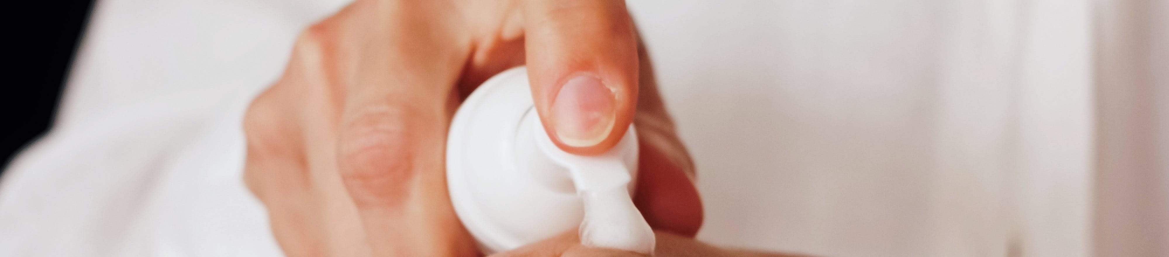 Applying lotion to hands