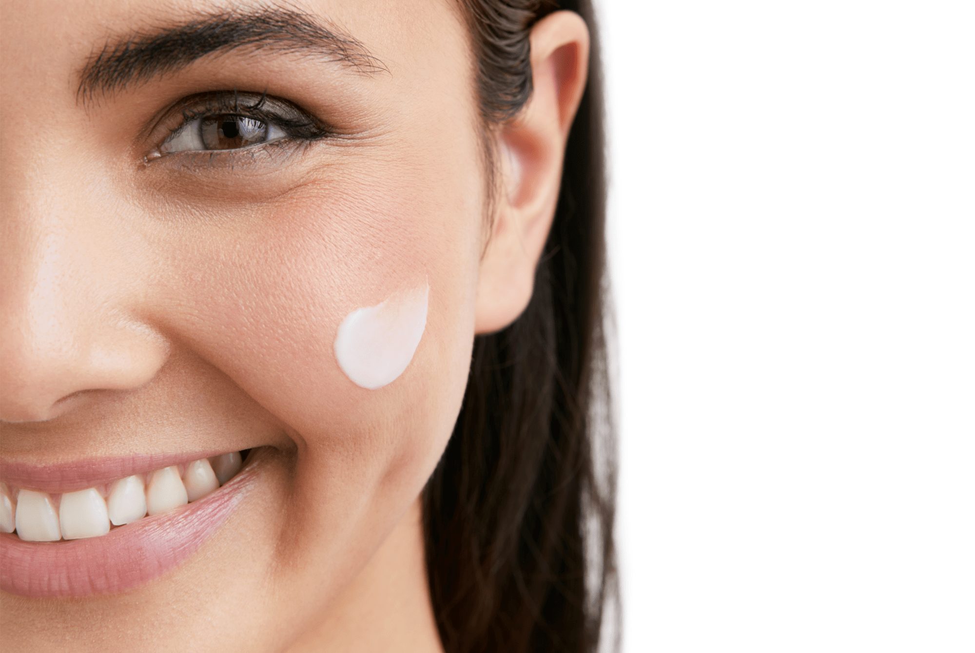 woman using cream as part of dry skin routine