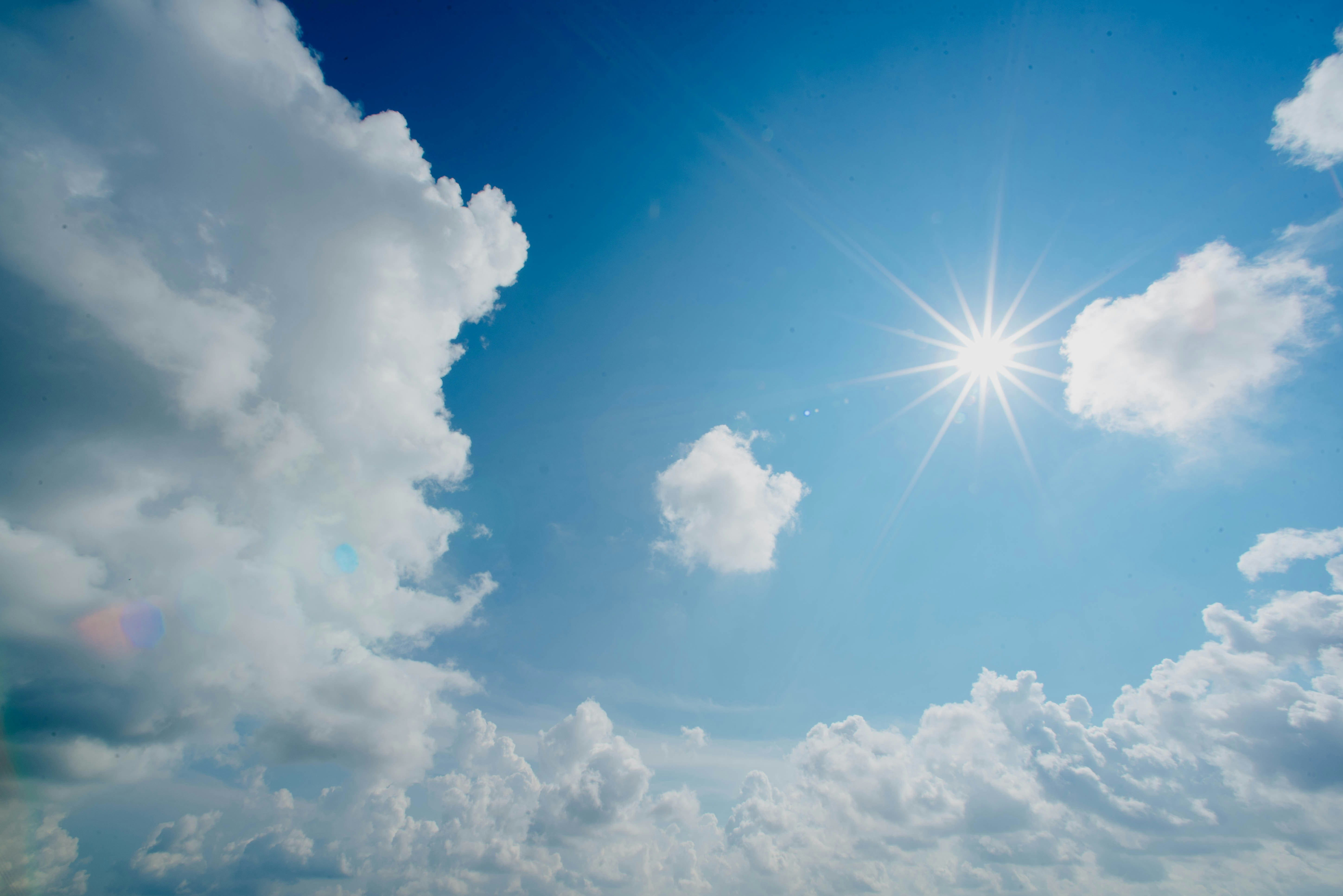 Image of blue skies with the sun shining