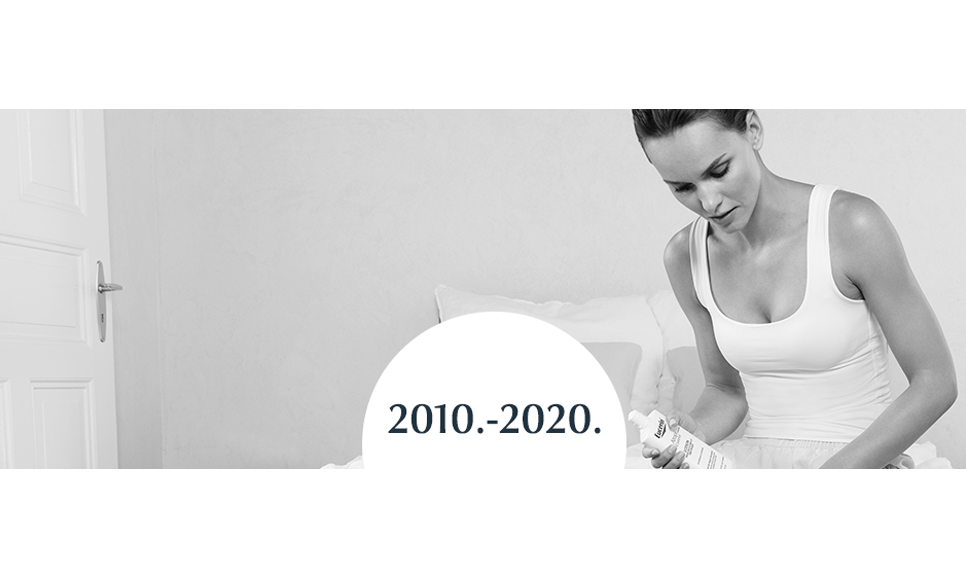 žena nanosi Eucerin njegu na tijelo