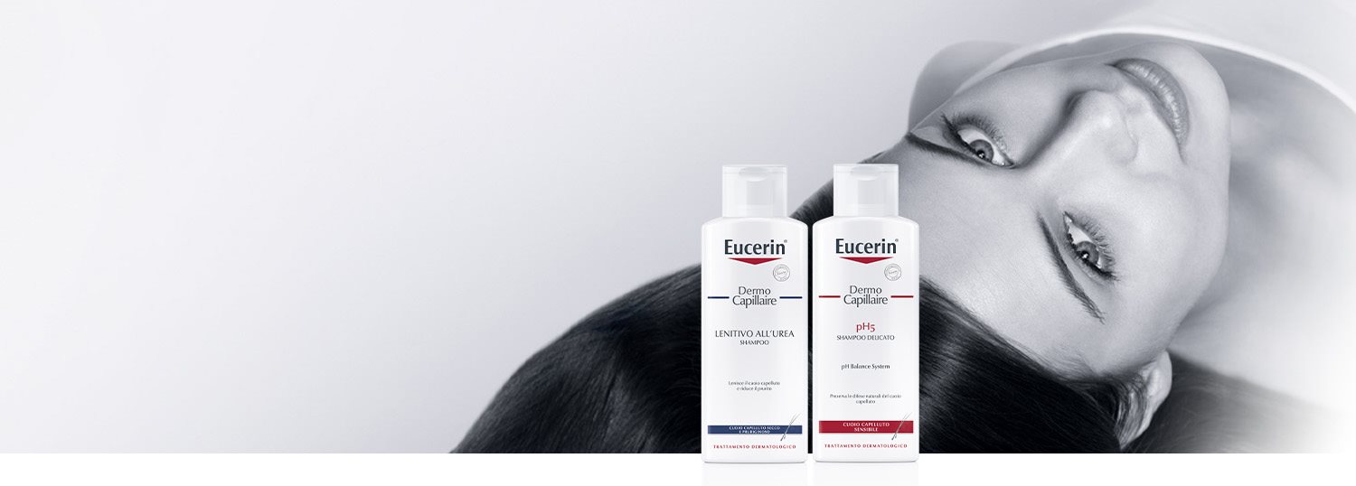 Donna con capelli llunghi folti e lucenti distesa