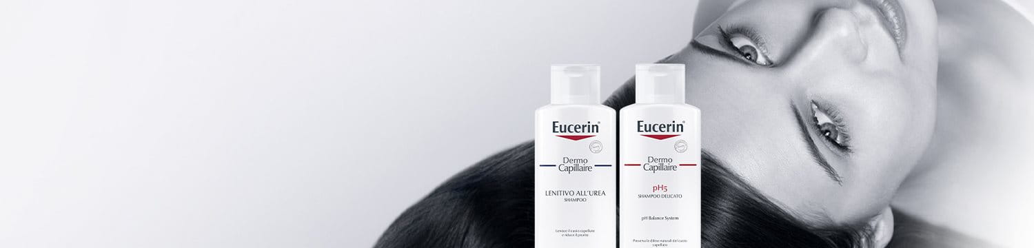 Donna con capelli llunghi folti e lucenti distesa