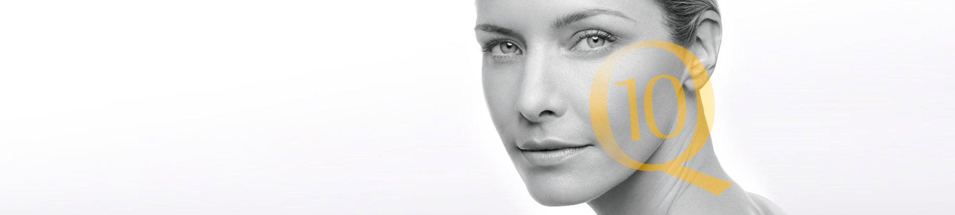 Volto di donna con simbolo Q10 sul viso 