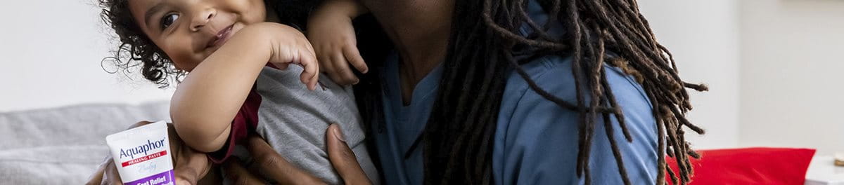 A father holding his baby