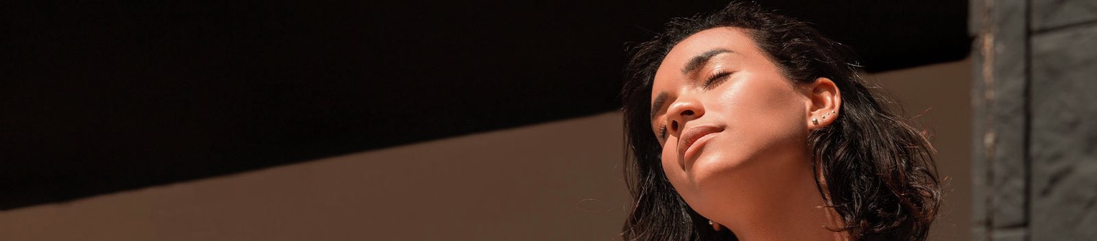 donna esposta al sole