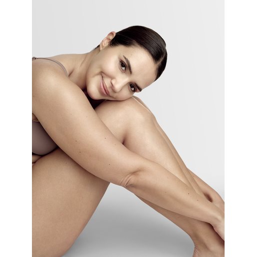 Woman using Eucerin AQUAporinACTIVE