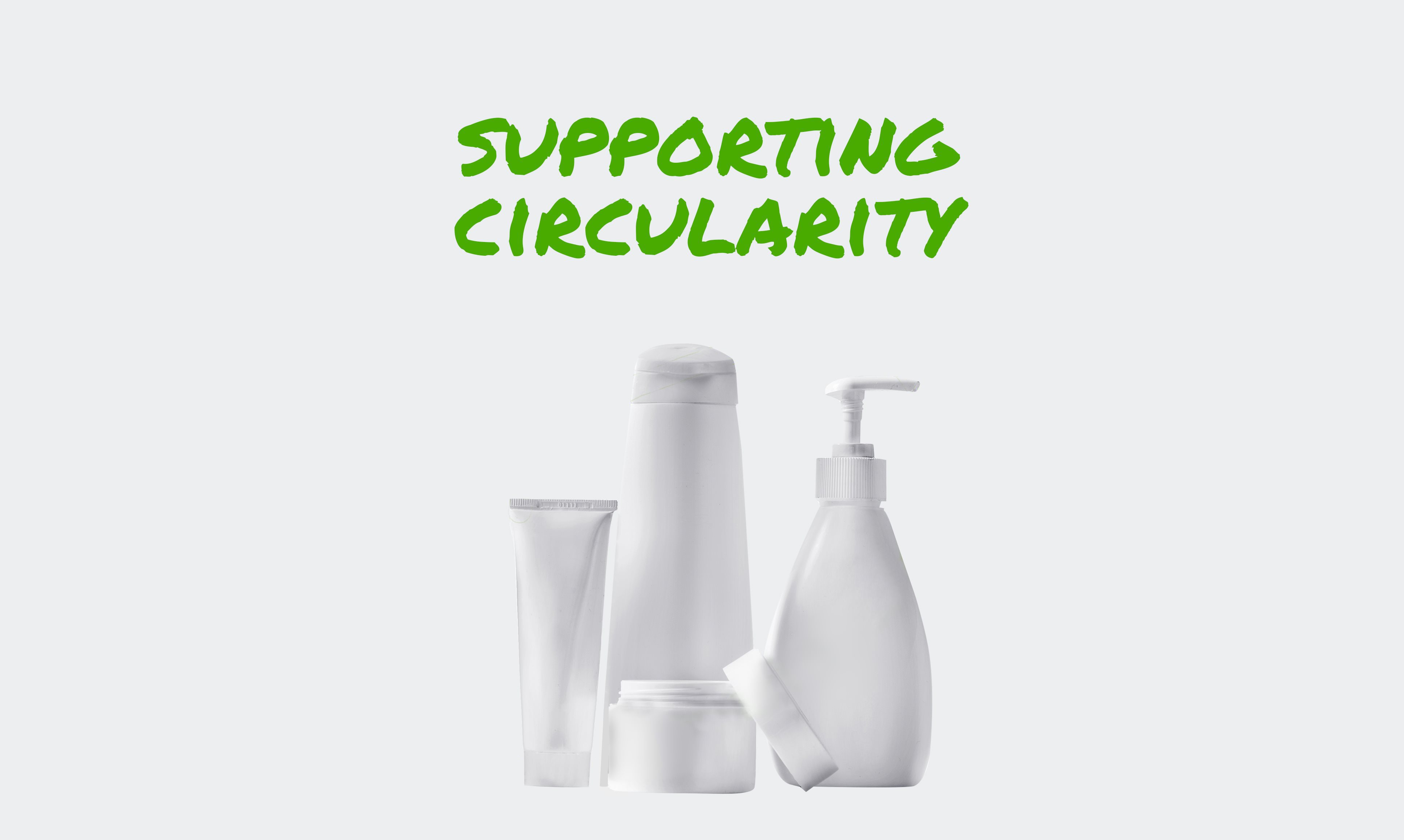 Three lotion bottles encircled by a stylized recycling symbol