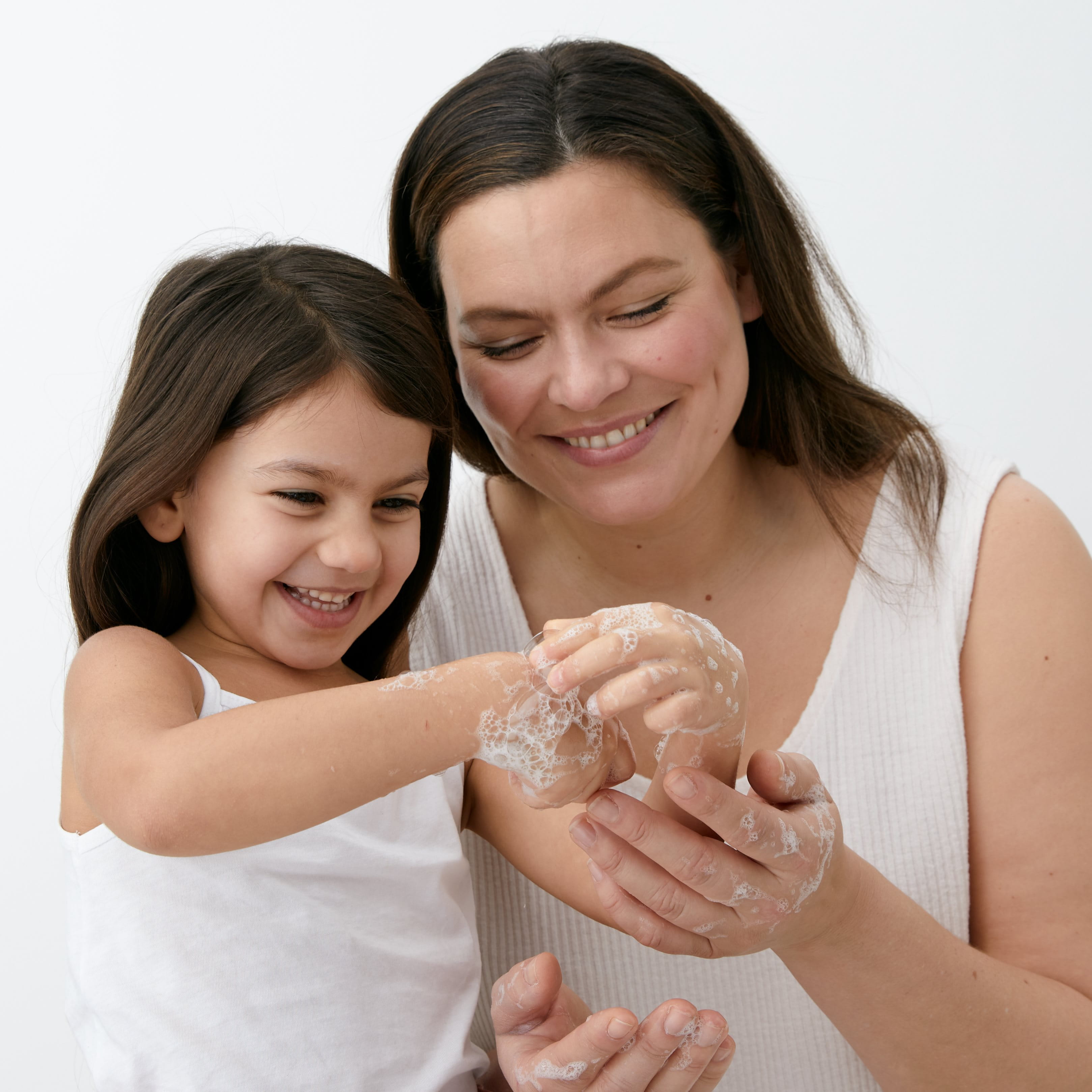 image of a woman and child washing their hands