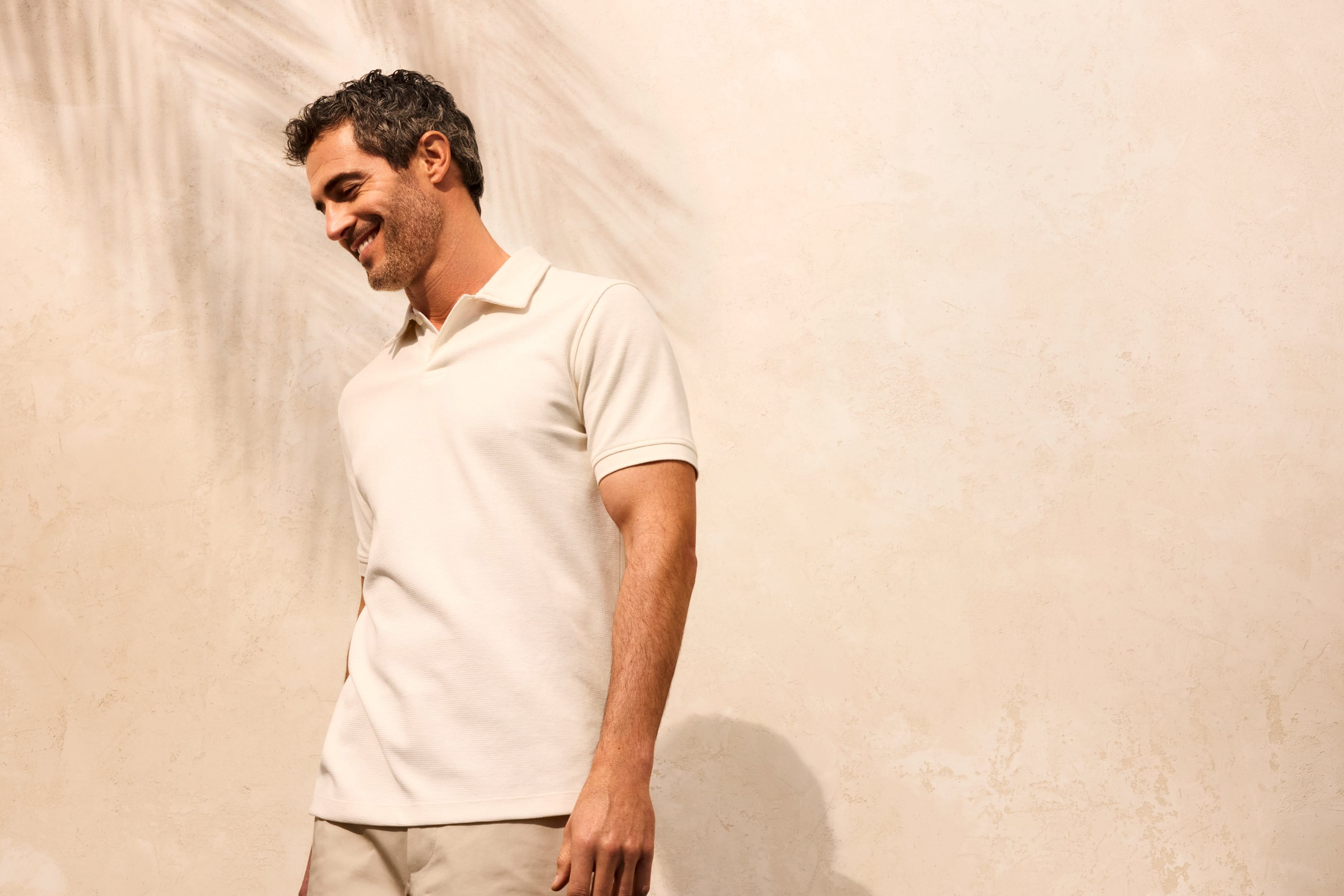 man standing under the sun