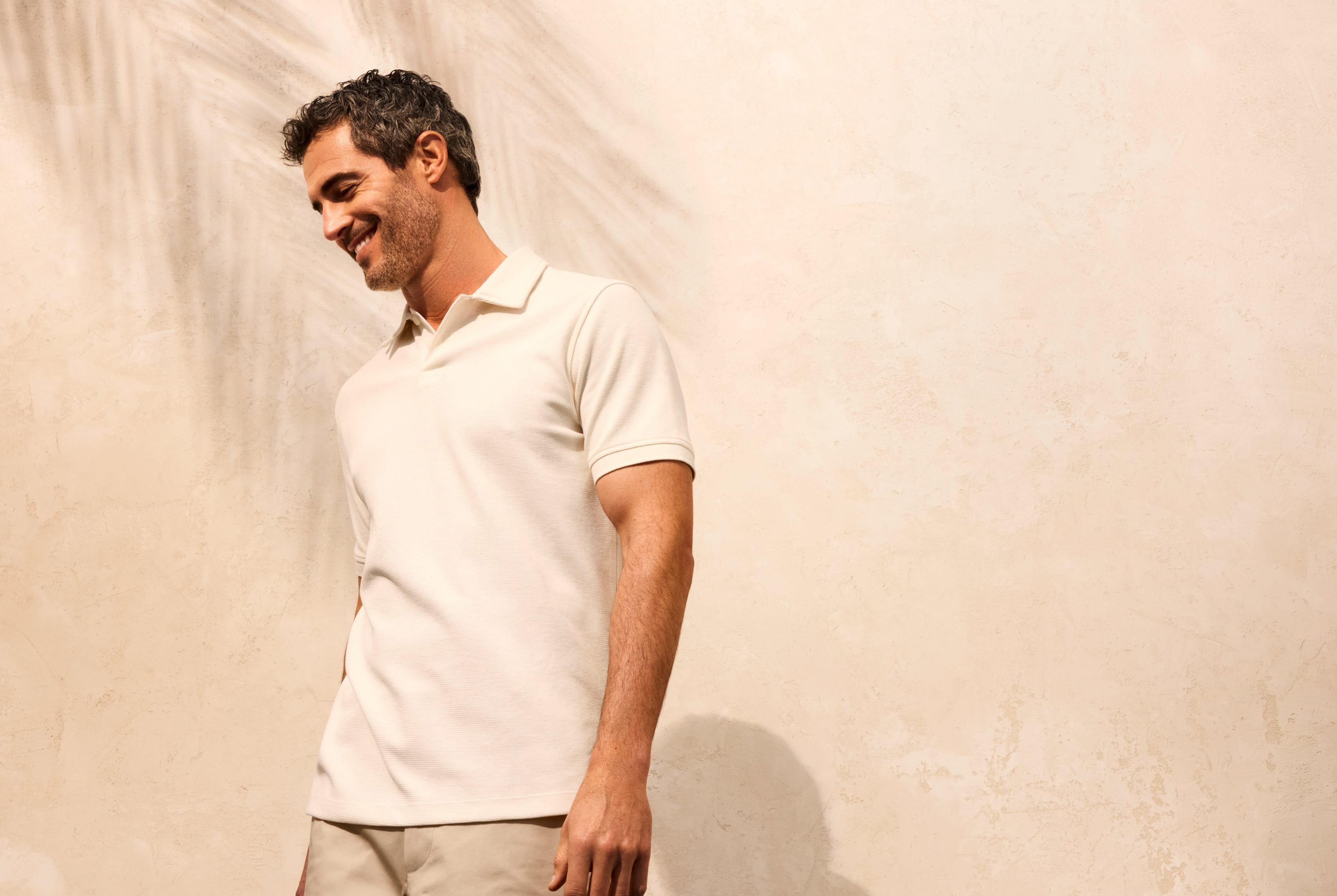 man standing under the sun