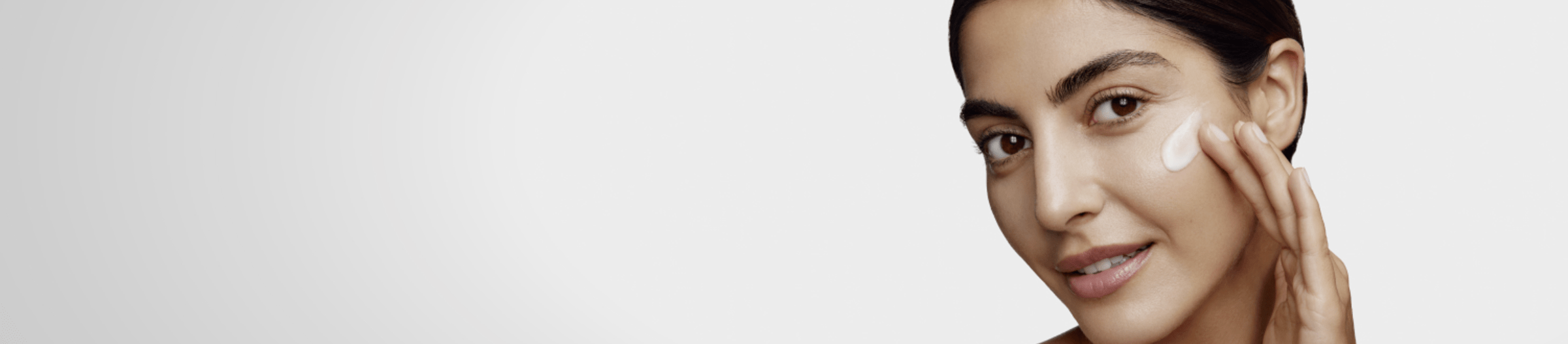 Woman touching her face