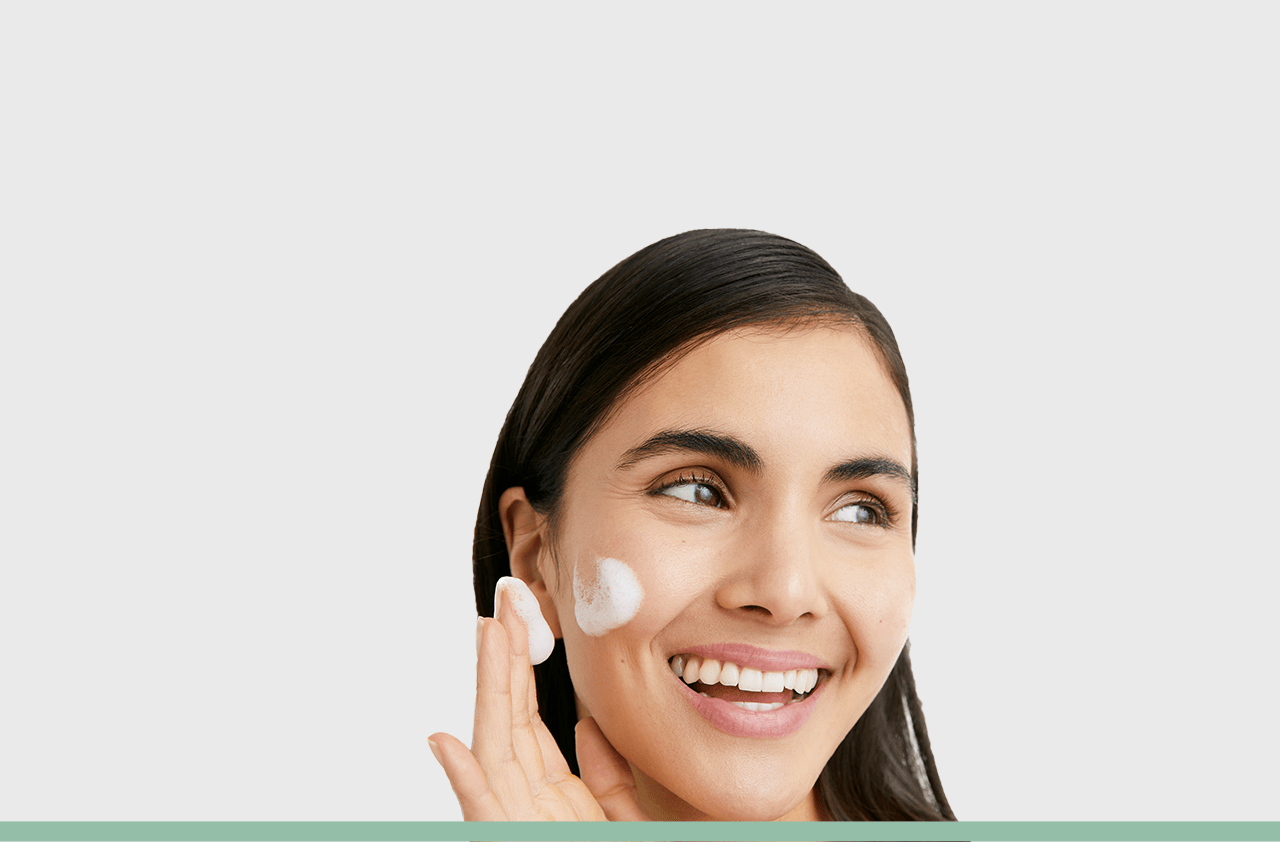 Woman Applying Anti-acne Product