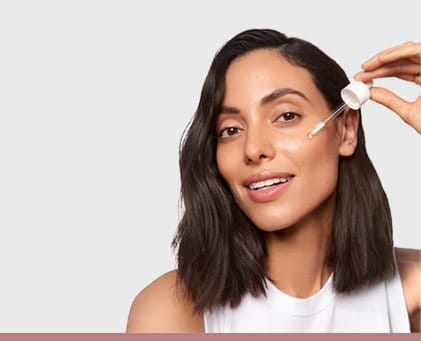 Women Applying Eucerin Face Serum