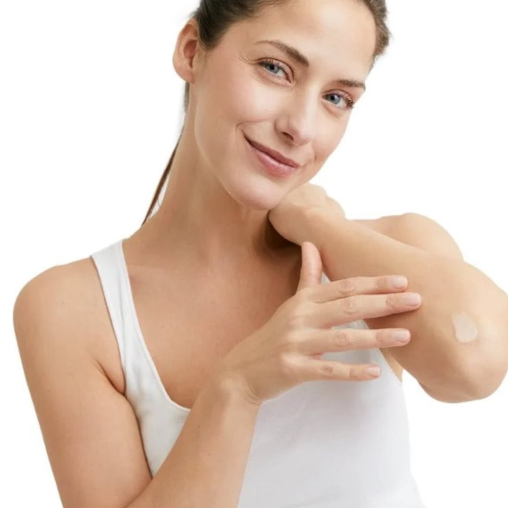 woman applying cream to elbow