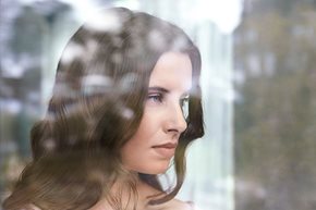 Woman looking out of the window