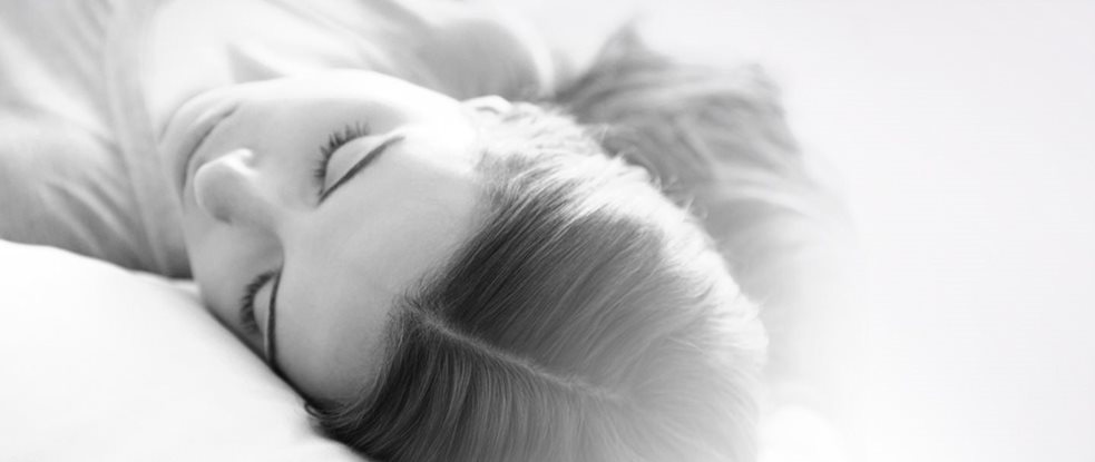 Sleeping woman with healthy scalp