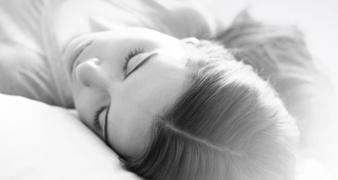 Sleeping woman with healthy scalp