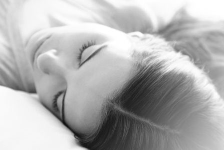 Sleeping woman with healthy scalp