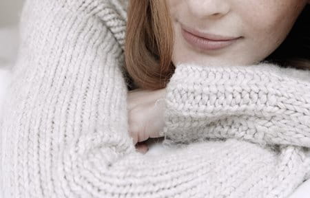 Woman wearing a cotton pullover.