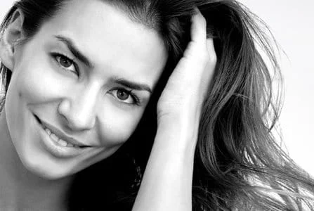 Middle-aged woman´s face with long dark hair