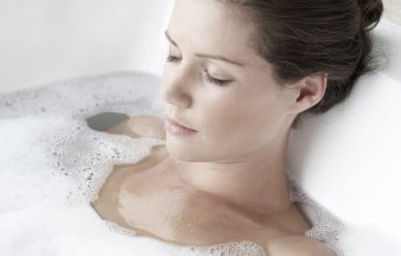 It is recommended to restrict bath time and temperature, as long bathing sessions can lead to moisture evaporation.