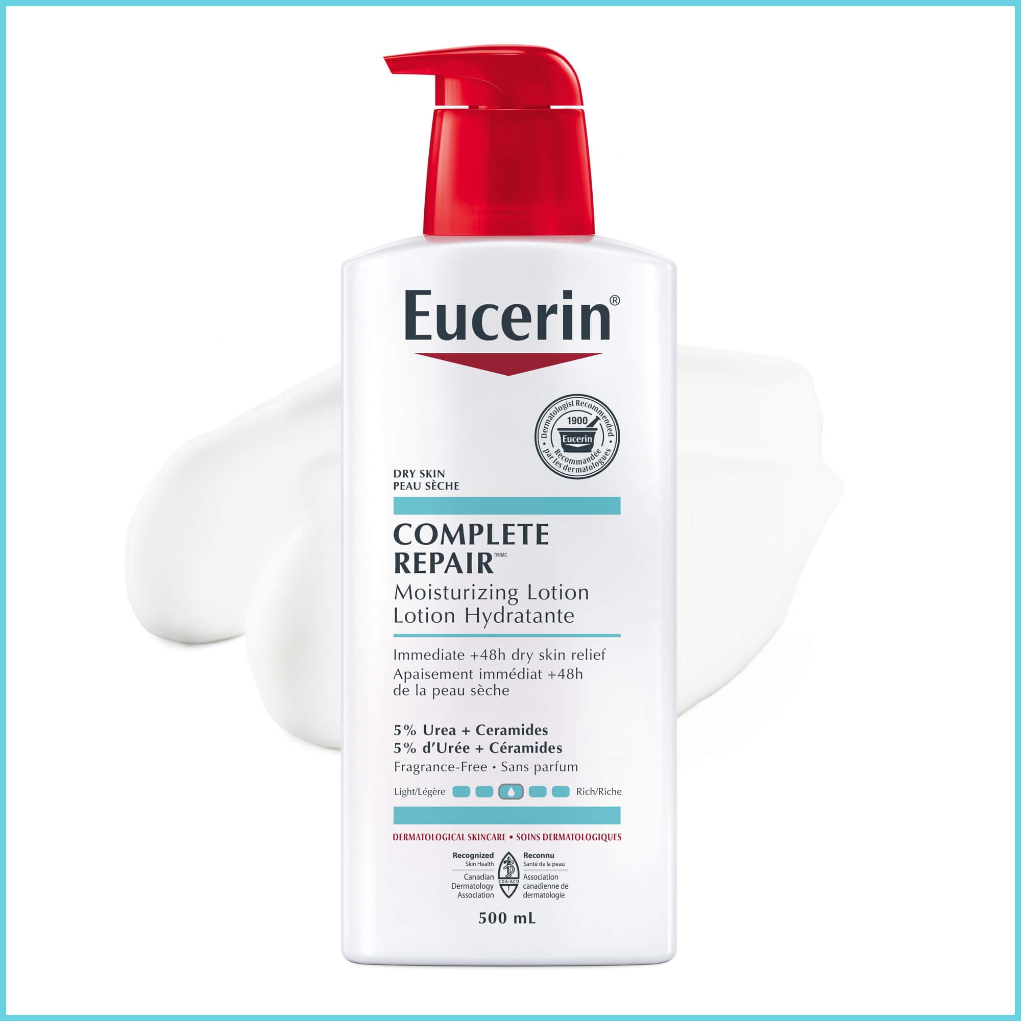 Close up view of 500mL Eucerin Complete Repair moisturizing lotion against a white background with product spread.