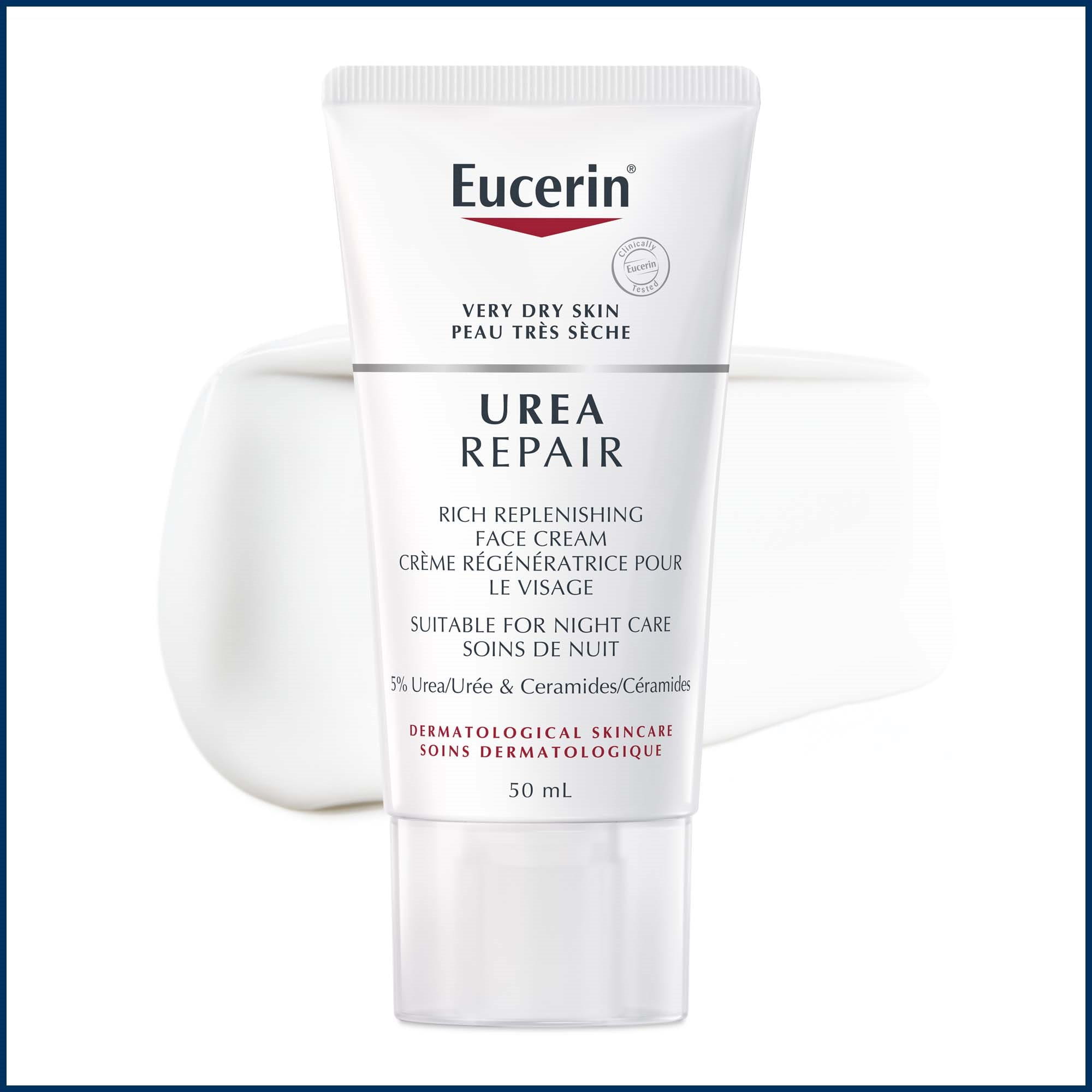 Gros plan du tube de Crème régénératrice pour le visage Urea Repair Eucerin soins de nuit de 50 mL, avec texture du produit en arrière-plan.