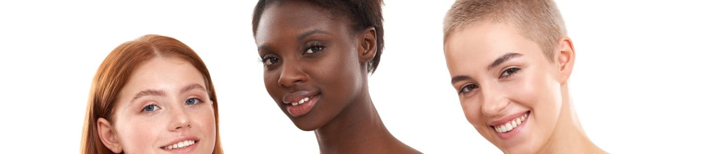Drei Frauen mit unterschiedlicher Hautpigmentierung