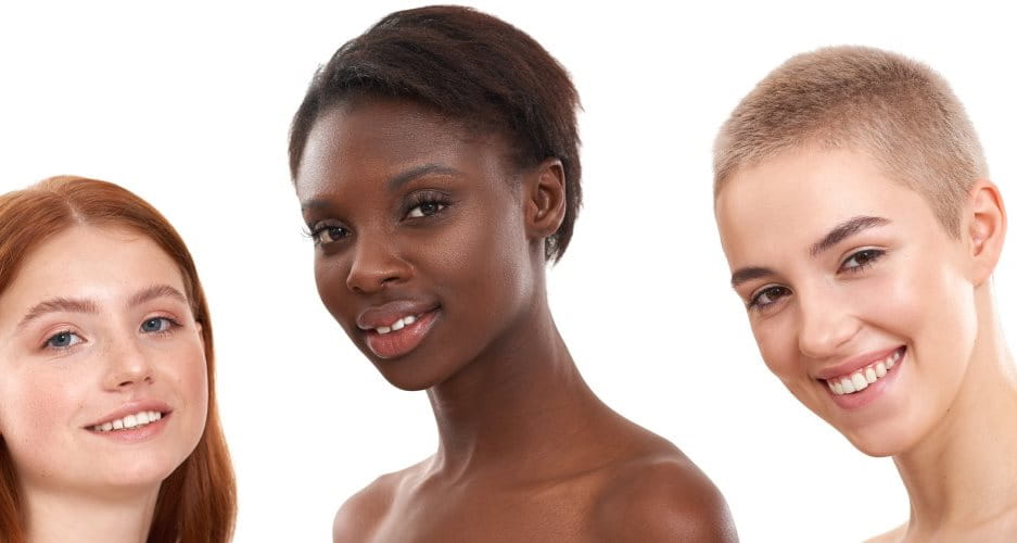 Drei Frauen mit unterschiedlicher Hautpigmentierung