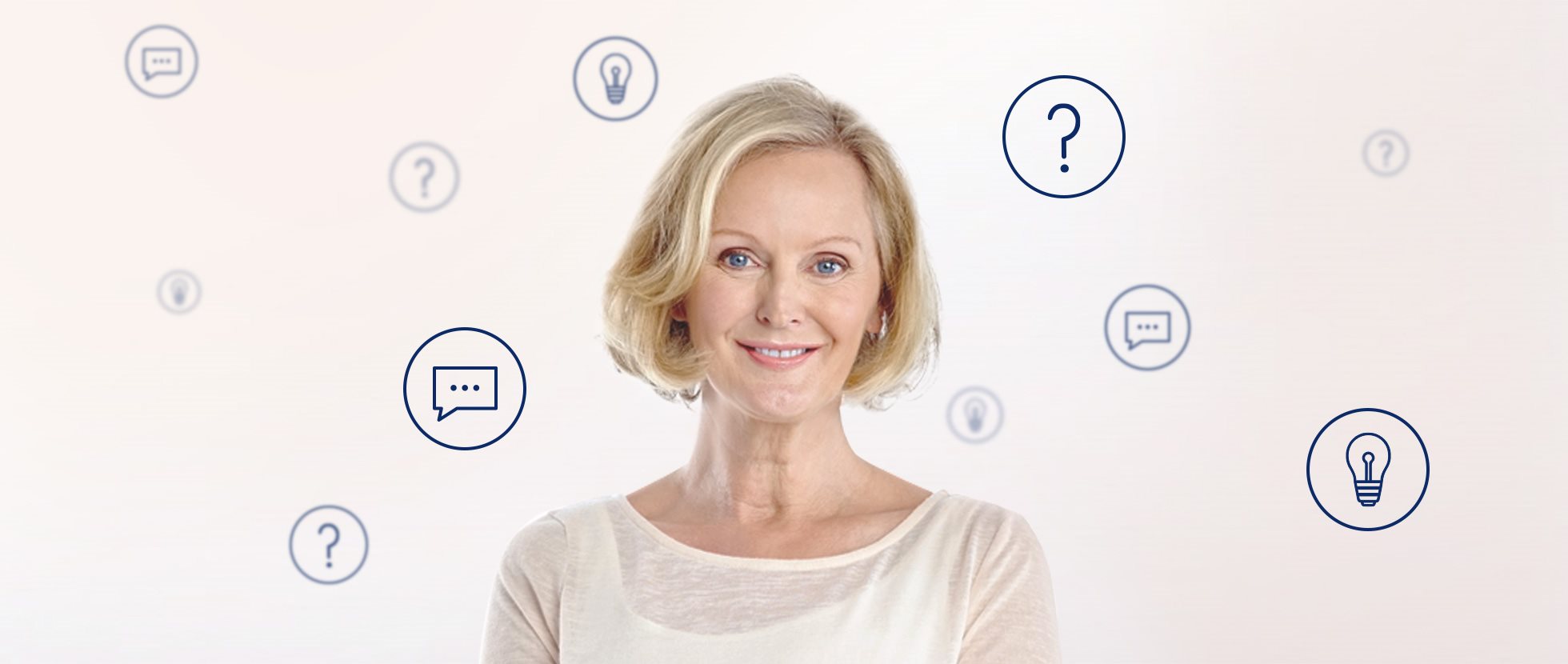 An elderly woman surrounded by bubbles of question marks and light bulbes