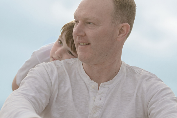 Man and son wearing Eucerin Actinic Control