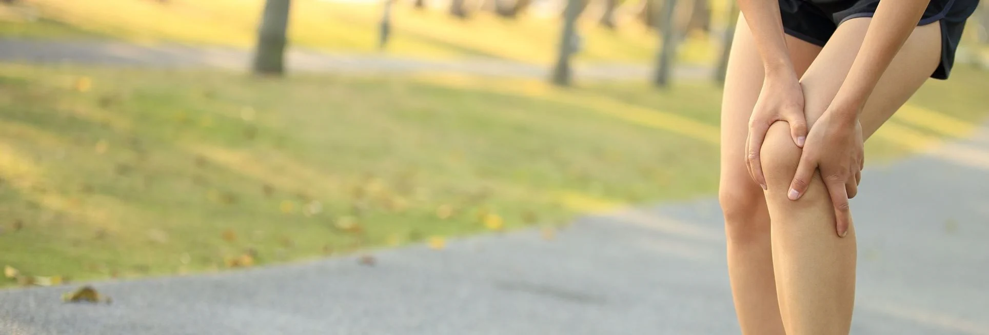 Women holding her knee