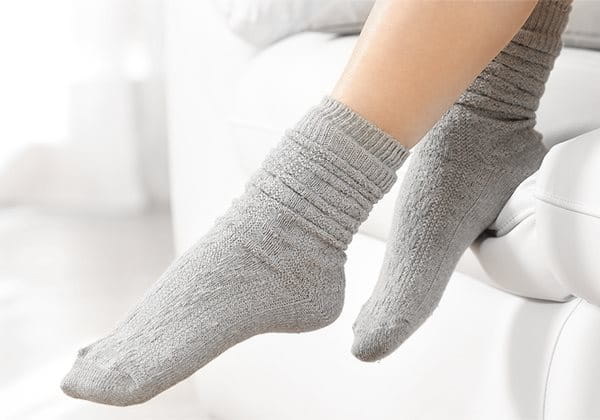 Füße in warmen Socken
