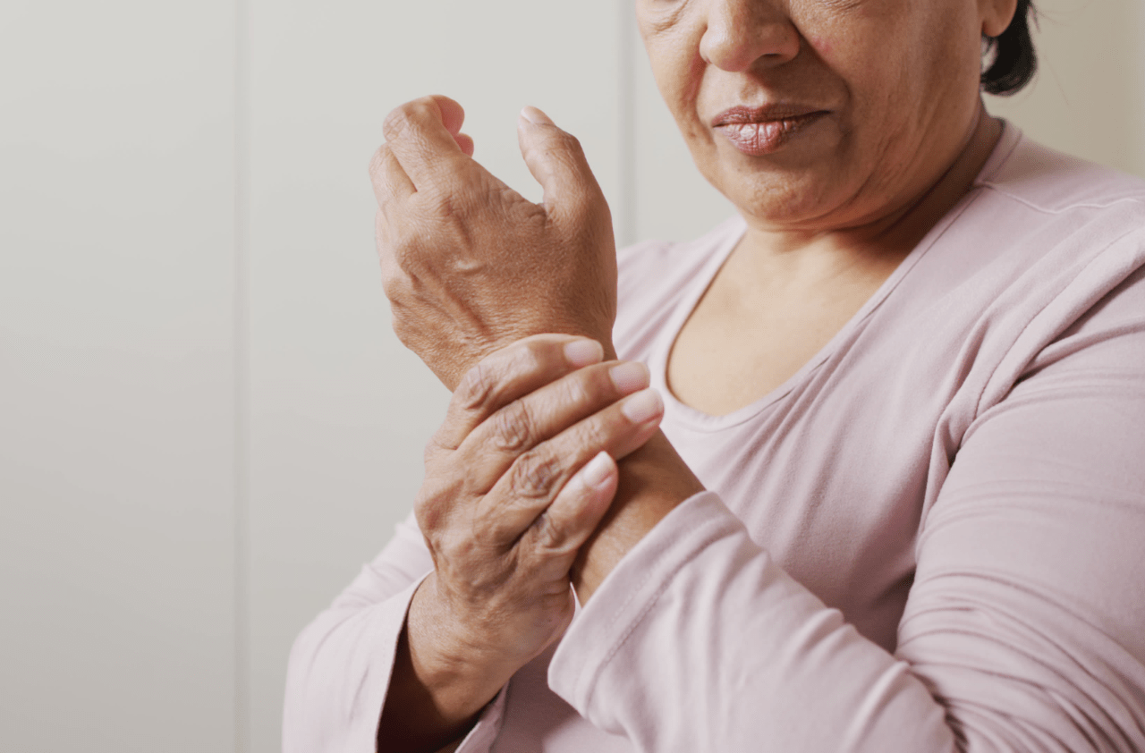 woman holding wrist