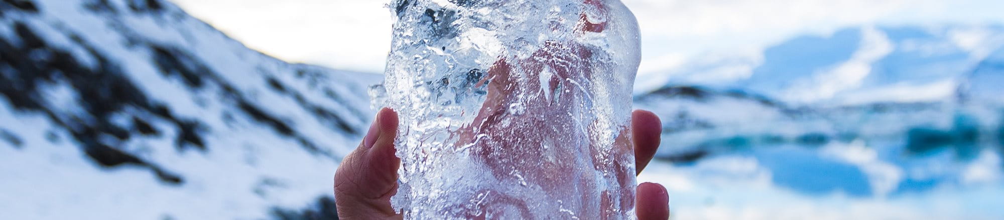 woman holding block of ice