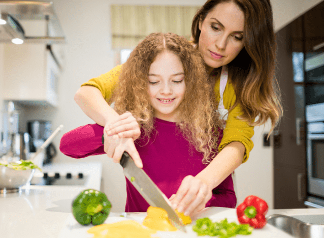 mother cooking with daughter