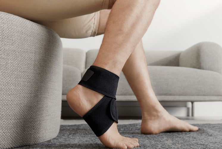 man wearing ankle support