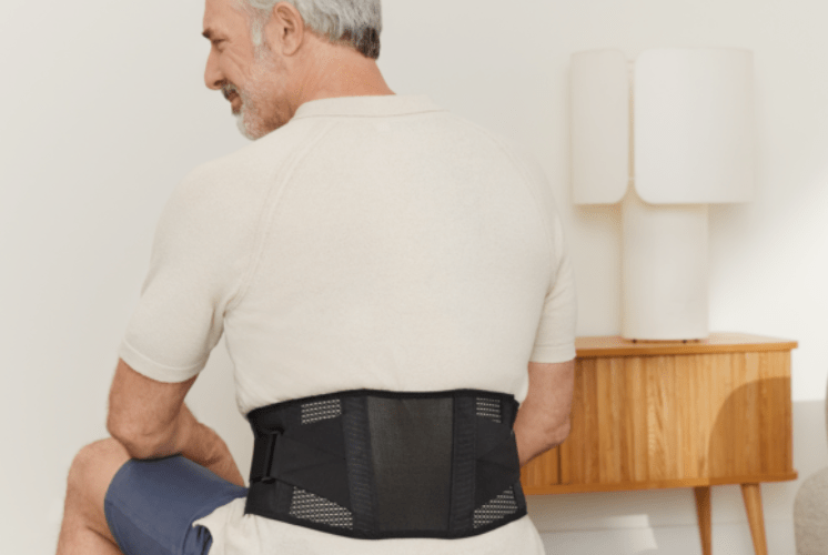 man wearing back support
