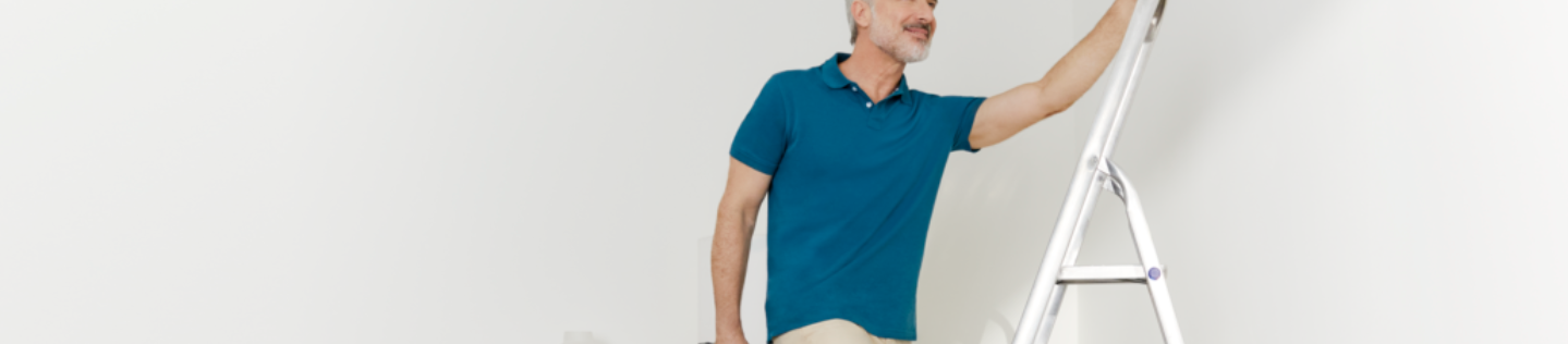 man wearing a knee support at home